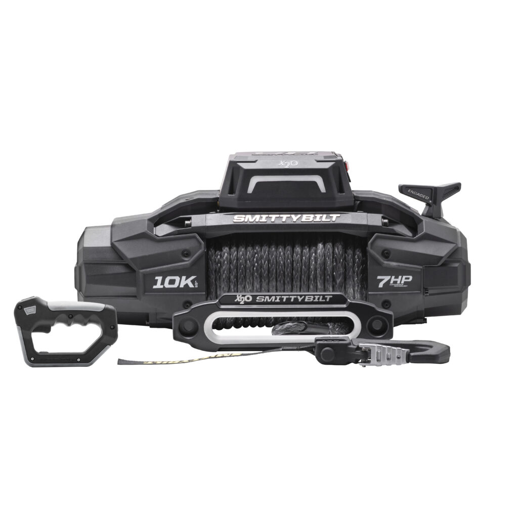 Smittybilt X2O 10K 7HP electric winch with synthetic rope and fairlead shown with remote